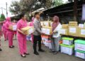 Bhayangkari Peduli Korban Kebakaran, Ny. Cathy Heri Ompusunggu Salurkan Bansos